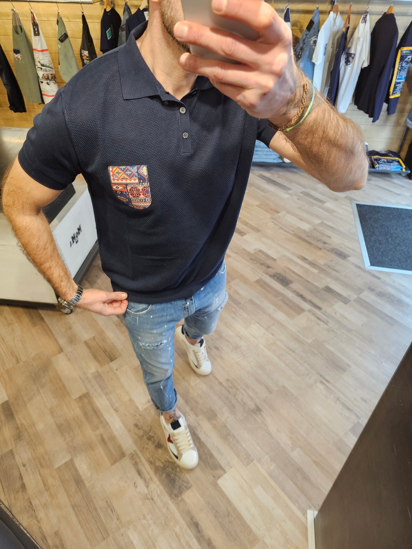 POLO IN MAGLIA BLU CON TASCA