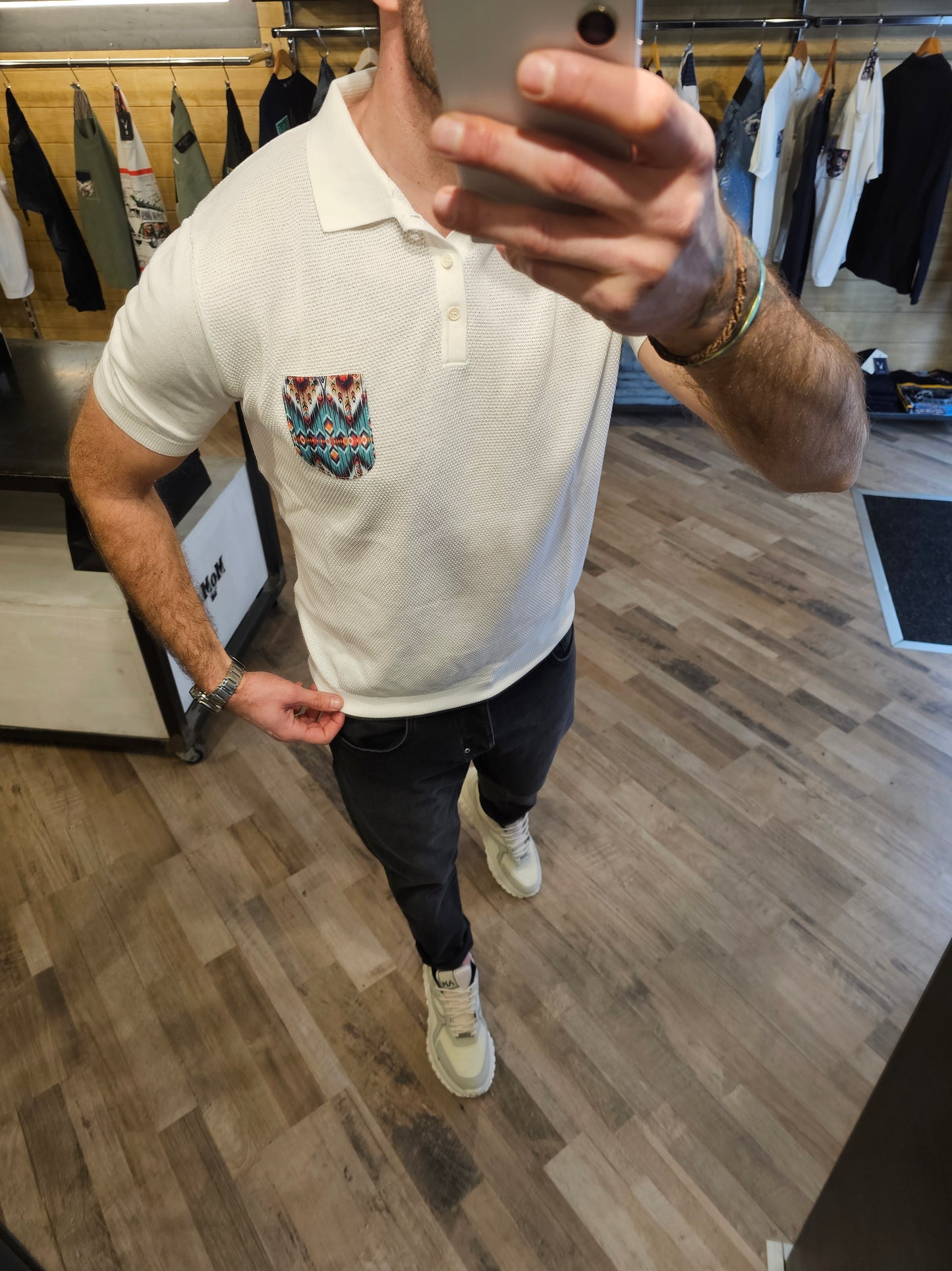 POLO IN MAGLIA CON TASCA