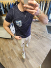 T-SHIRT TASCHINO E SCHIZZI VERNICE