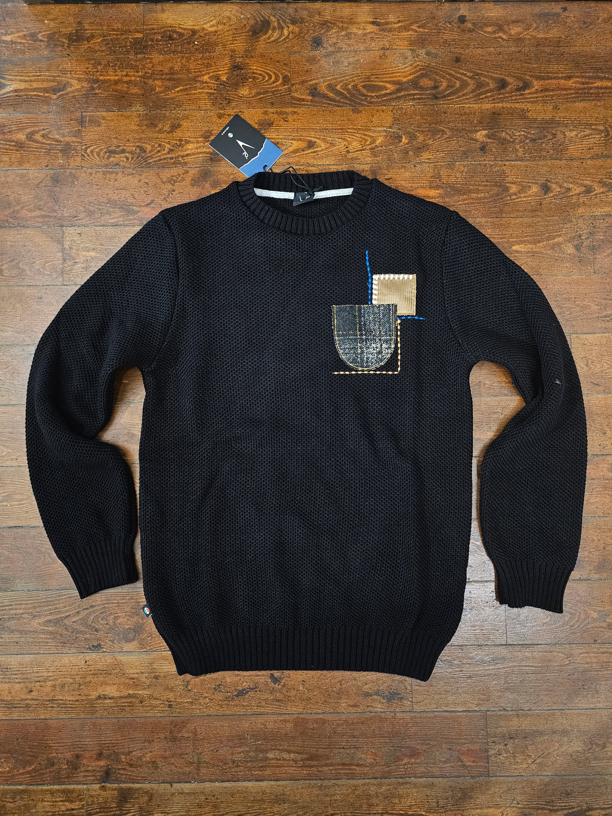 MAGLIA OCCHIO PERNICE NERA