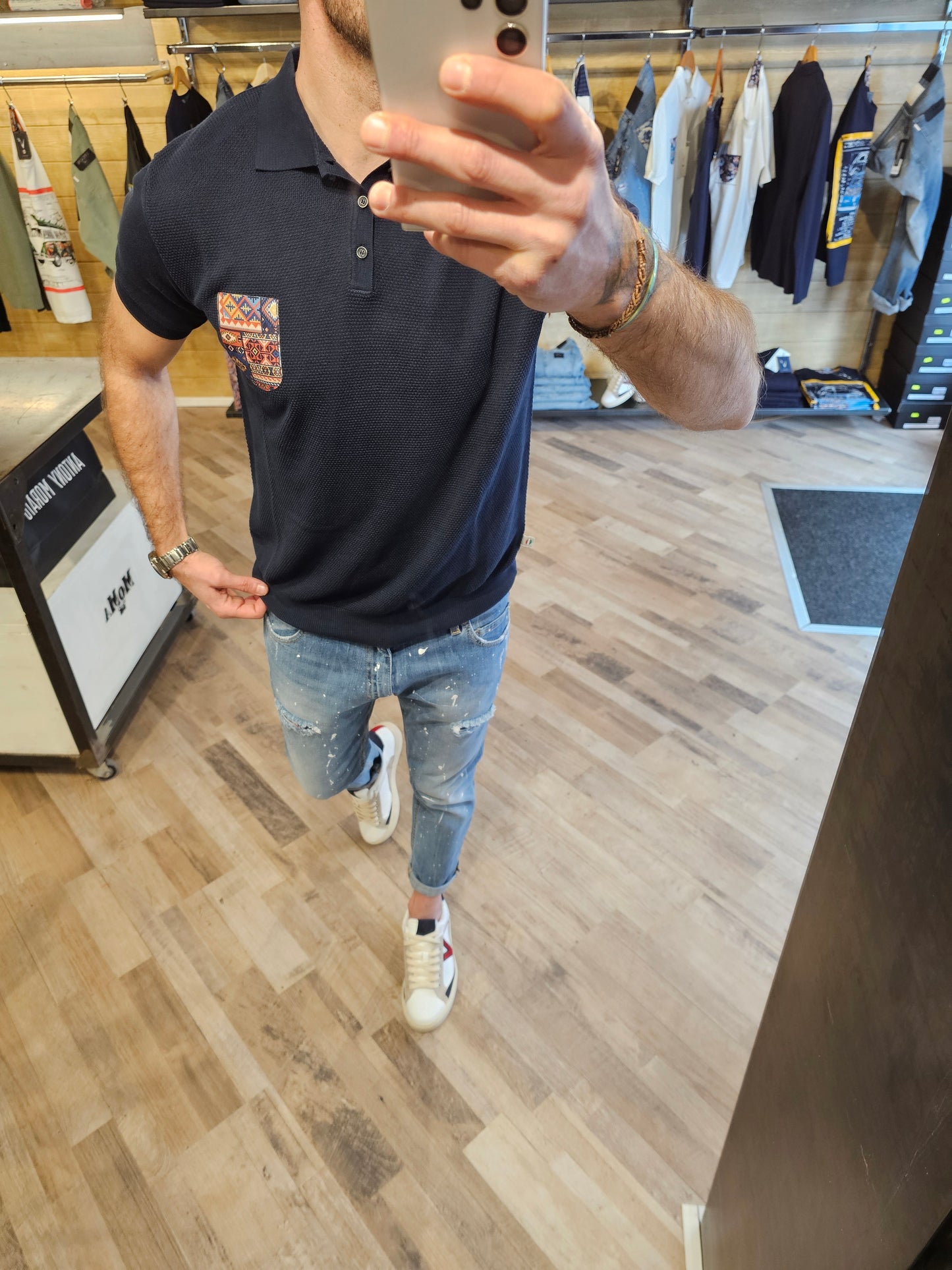 POLO IN MAGLIA BLU CON TASCA