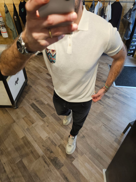 POLO IN MAGLIA CON TASCA