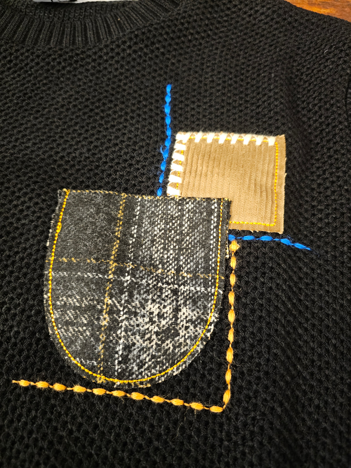 MAGLIA OCCHIO PERNICE NERA